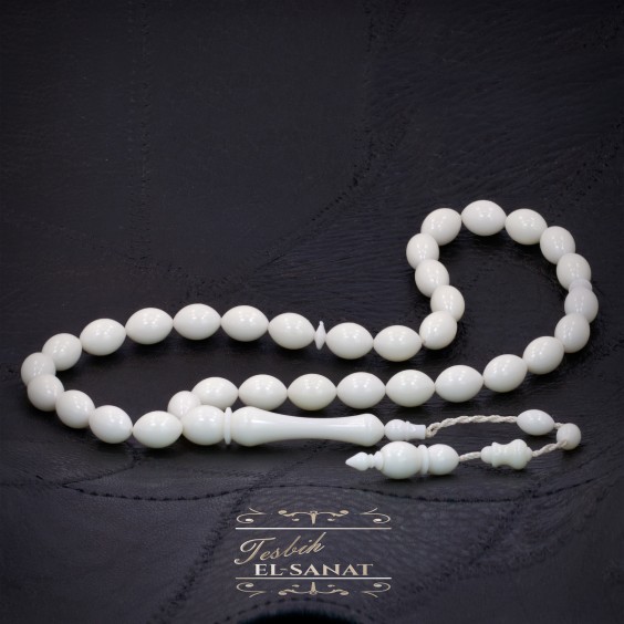 Deve Kemiği Usta İşi Sistemli Püsküllü Tesbih (8,5 x 12,5mm) Deve Kemiği Usta İşi Sistemli Püsküllü Tesbih (8,5 x 12,5mm)