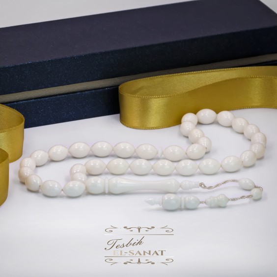 Deve Kemiği Usta İşi Sistemli Püsküllü Tesbih (8,5 x 12,5mm) Deve Kemiği Usta İşi Sistemli Püsküllü Tesbih (8,5 x 12,5mm)